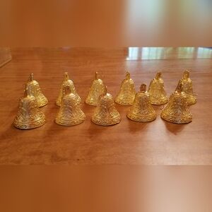 Eleven pretty and delicate lightweight bell ornaments. Gold color.
